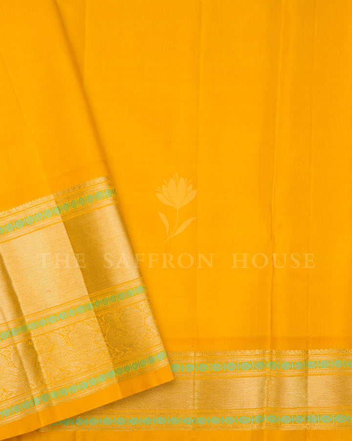 Parrot Green Kanchivaram Silk Saree with Zari Diamond Jaal & Golden Yellow Peacock Border