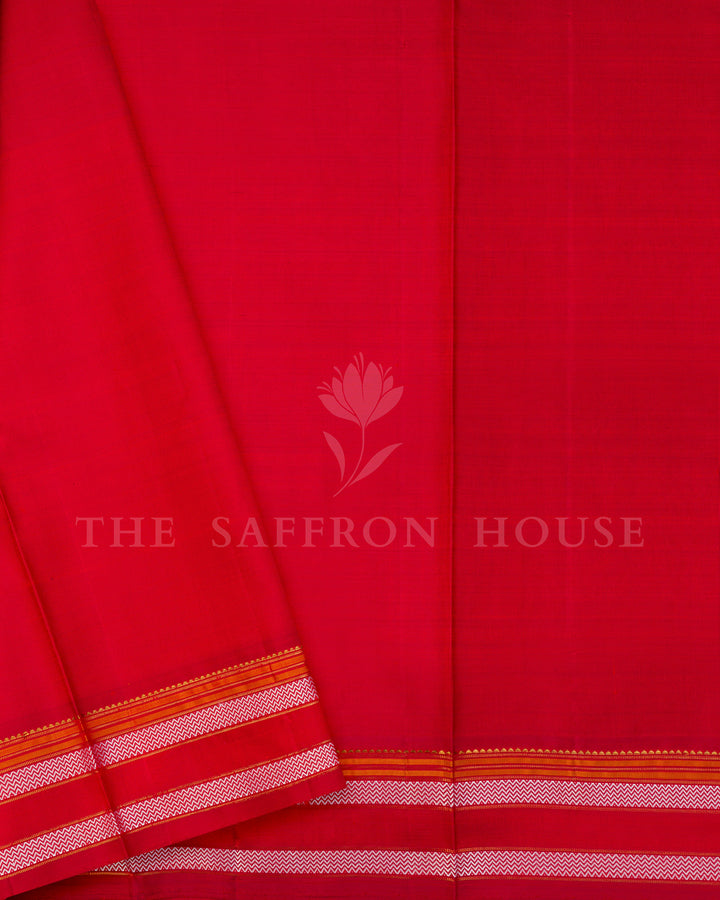 Red Kanchivaram Silk Saree with Silver Zari Buttis, White Zigzag Border