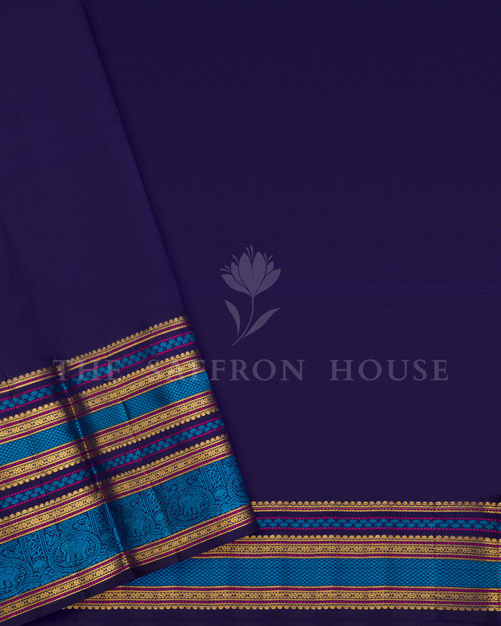 Powder Blue Kanchivaram Silk Saree with Navy Elephant Buttis, Multicolor Border