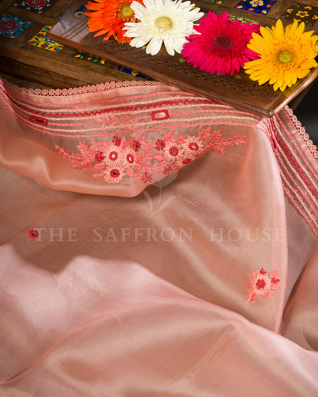 Peach Organza Saree with Floral Thread Embroidery, Mirror Work and Crochet Lace Border