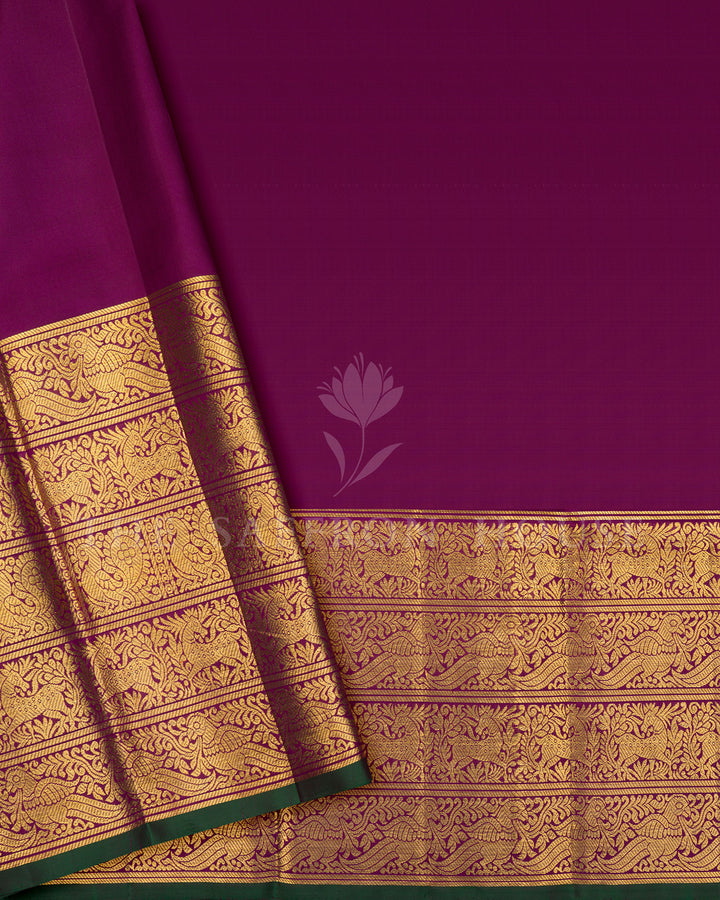 Purple Kanchivaram Silk Saree with Gold Zari Buttas & Peacock Border