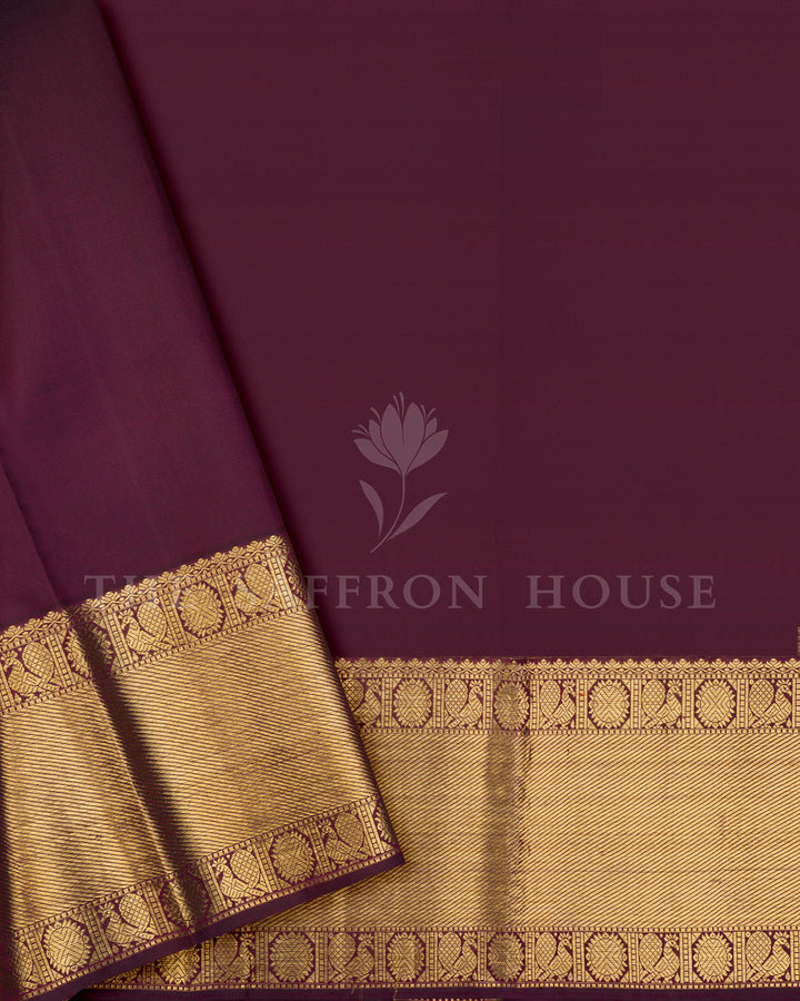 Burgundy Kanchivaram Silk Saree with Gold Leaf Weave & Peacock Border