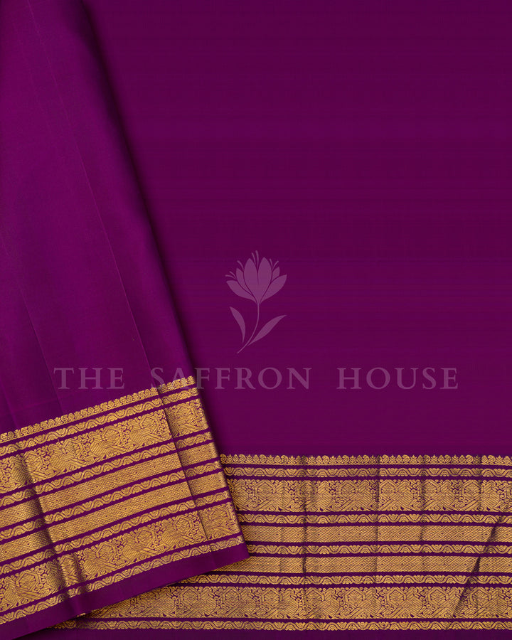 Peacock Blue Kanchivaram Silk Saree with Purple Zari Striped Border