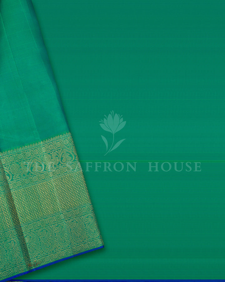 Purple Ikat Kanchivaram Silk Saree with Emerald Green Paisley Border & Pallu