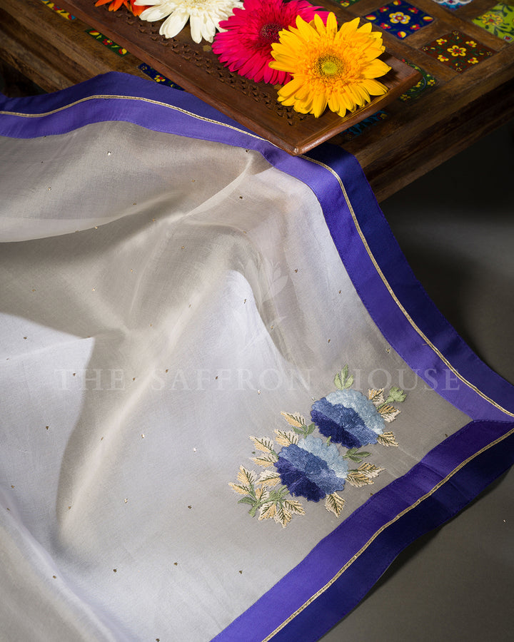 Ivory Tussar Silk Saree with Blue Floral Embroidery & Contrast Blue Blouse
