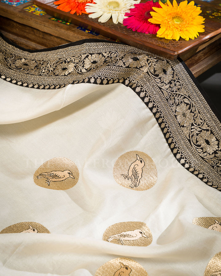 Ivory Tussar Silk Saree with Bird Motif Butis & Contrast Black Zari Border