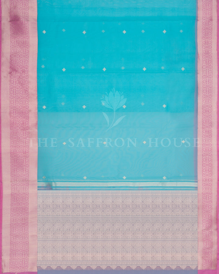 Turquoise Blue Kora Banarasi Saree with Silver Buttas & Mauve Floral Brocade Border – Handwoven Elegance