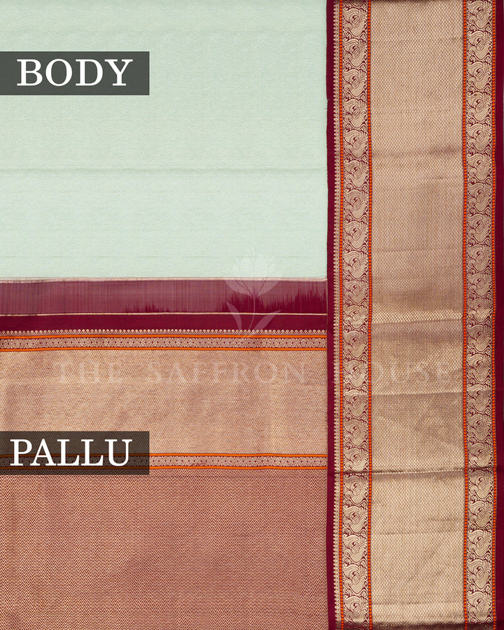 Mint Green Korvai Kanchivaram Silk Saree with Diagonal Zari Texture & Maroon Peacock Border