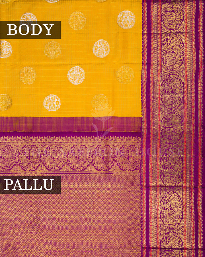 Yellow Kanchivaram Silk Saree with Silver Medallion Buti & Magenta Peacock Border