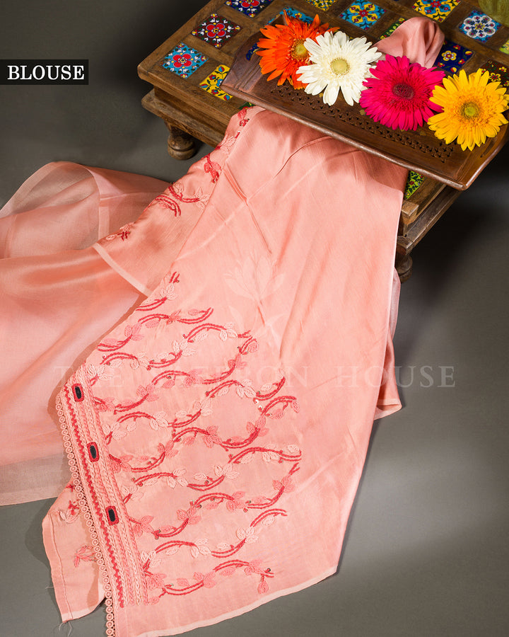 Peach Organza Saree with Floral Thread Embroidery, Mirror Work and Crochet Lace Border