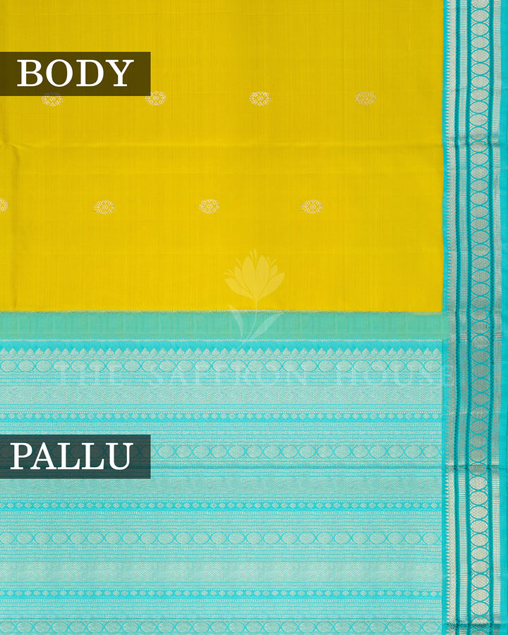 Yellow Kanchivaram Silk Saree with Silver Zari Butis & Turquoise Contrast Border