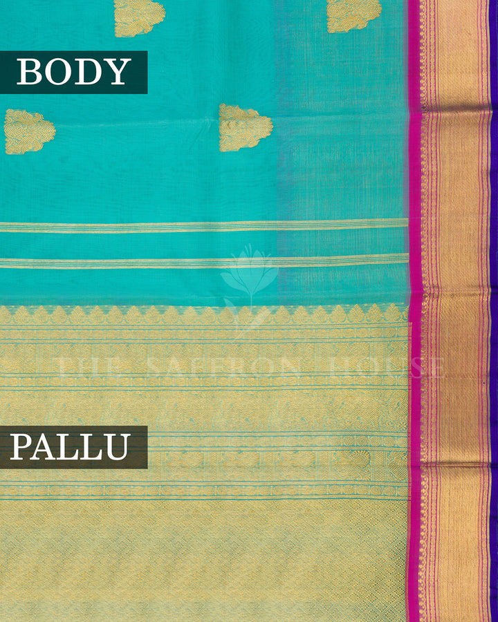 Turquoise Kora Kanchivaram Silk Saree with Gold Zari Butis & Magenta-Blue Contrast Border