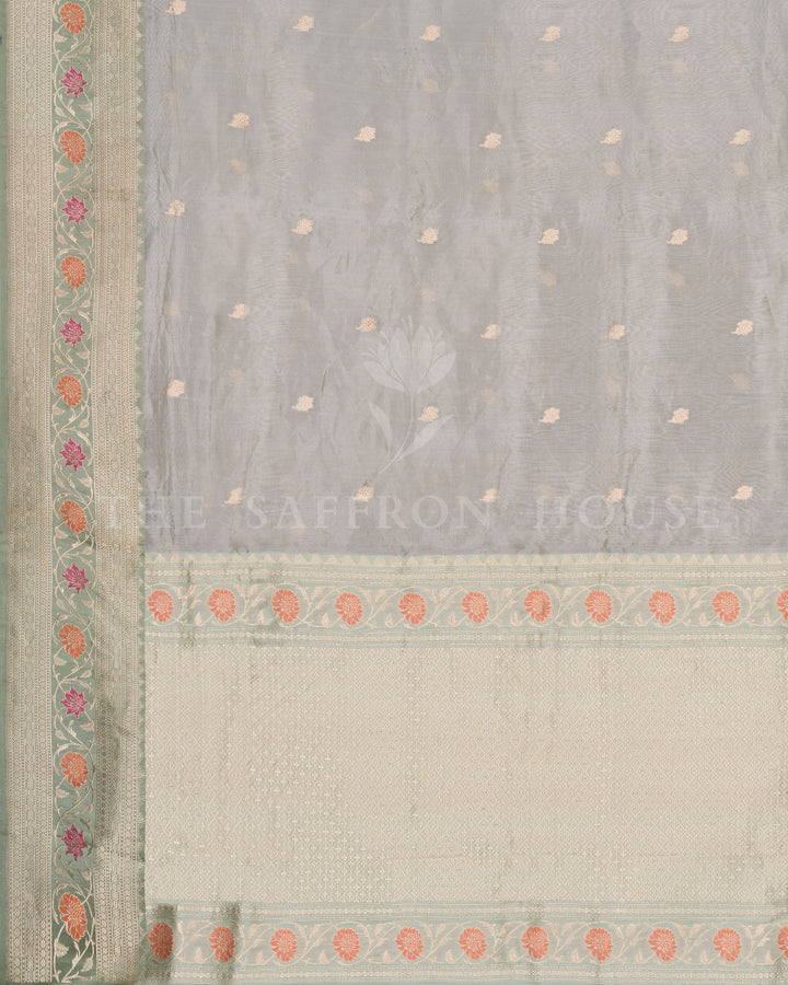 Mint Green Kora Banarasi Saree with Peach and Magenta Floral Zari Border