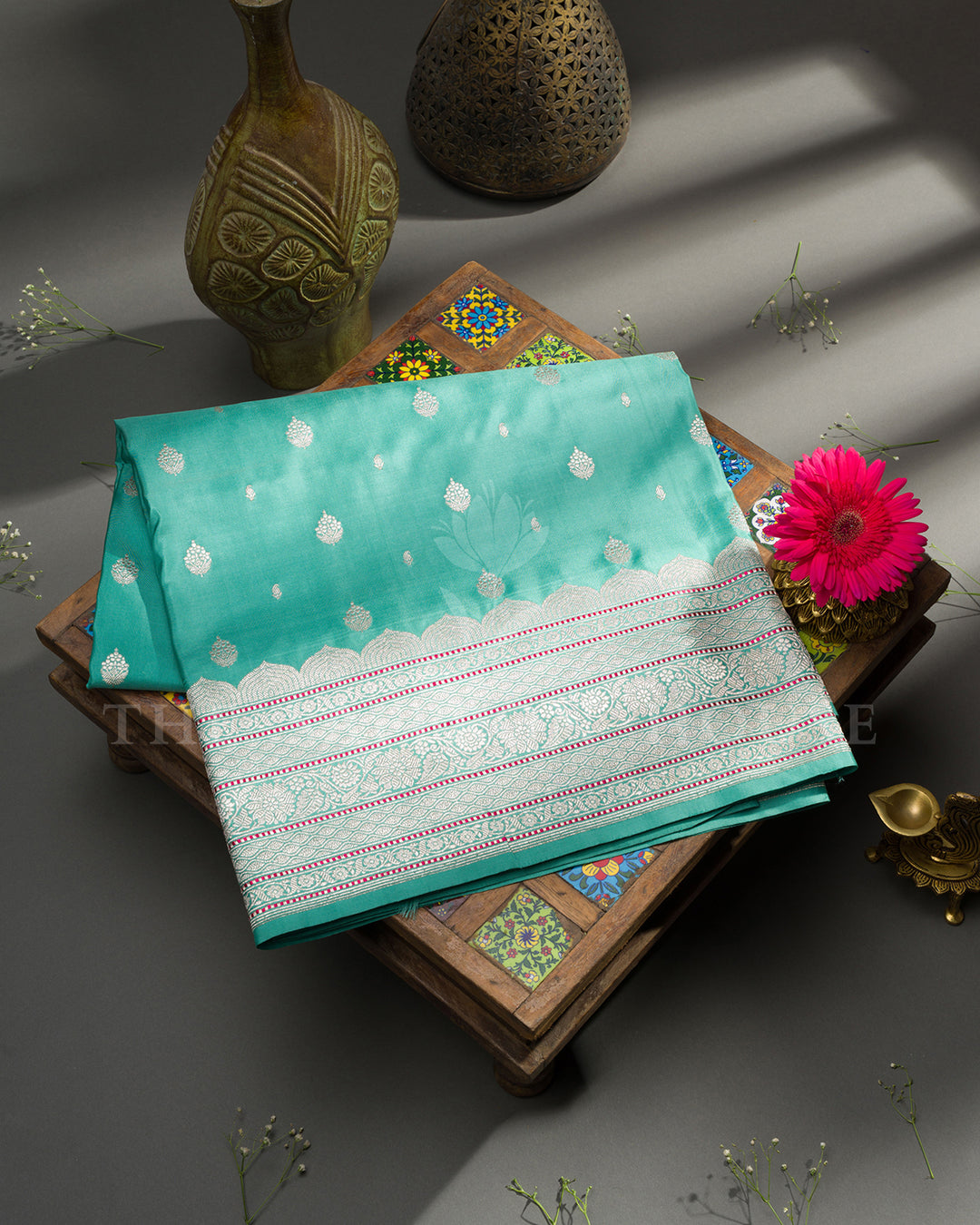 Turquoise Banarasi Silk Saree with Scattered Silver Zari Buti & Scalloped Floral Border