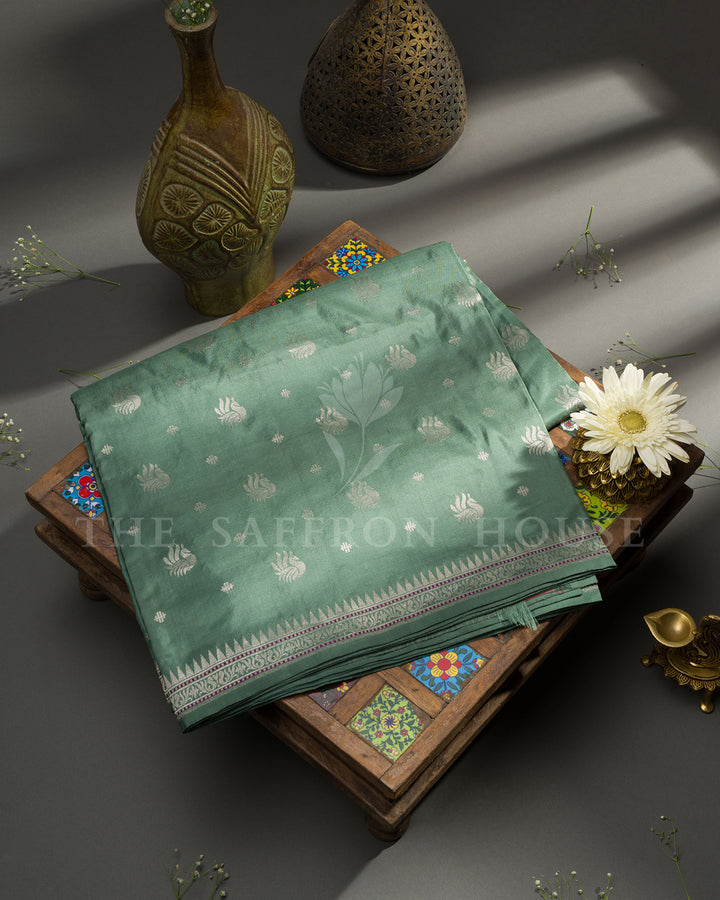 Sea Green Banarasi Silk Saree with Scattered Silver Zari Paisley Buti & Temple Border