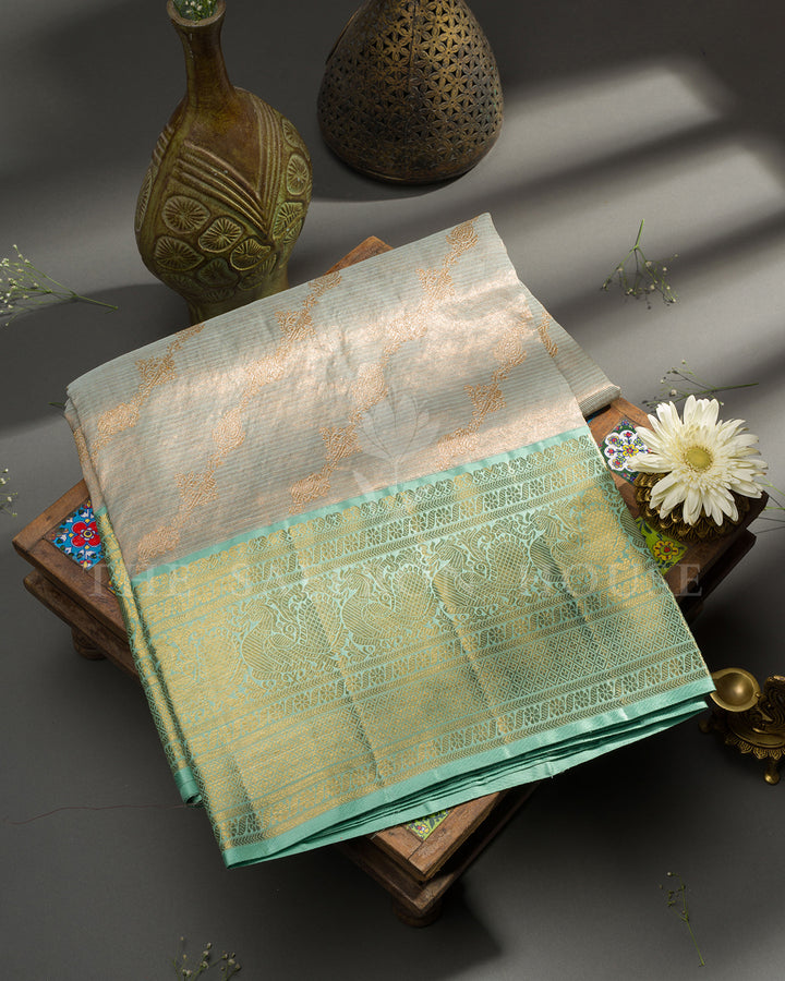Sea Green Kanchivaram Silk Saree with Diagonal Gold Zari Weave & Peacock Motif Border