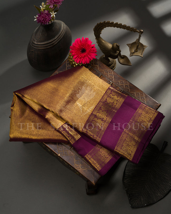 Gold Kanchivaram Silk Saree with Diagonal Zari Texture & Wine Peacock Border
