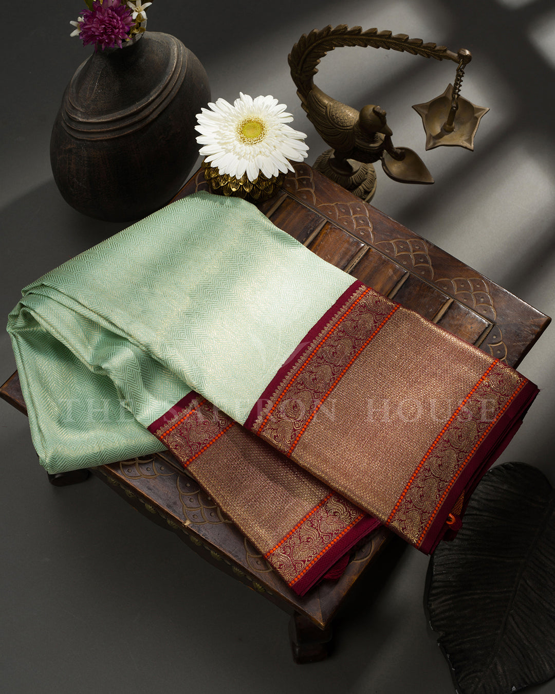 Mint Green Korvai Kanchivaram Silk Saree with Diagonal Zari Texture & Maroon Peacock Border