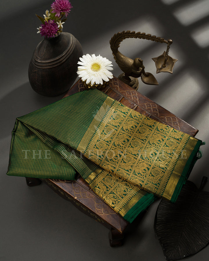 Emerald Green Kanchivaram Silk Saree with Checkered Zari Weave & Gold Elephant Procession Border