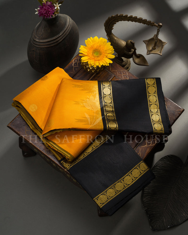Golden Yellow Kanchivaram Silk Saree with Zari Buttis & Black Coin Motif Border