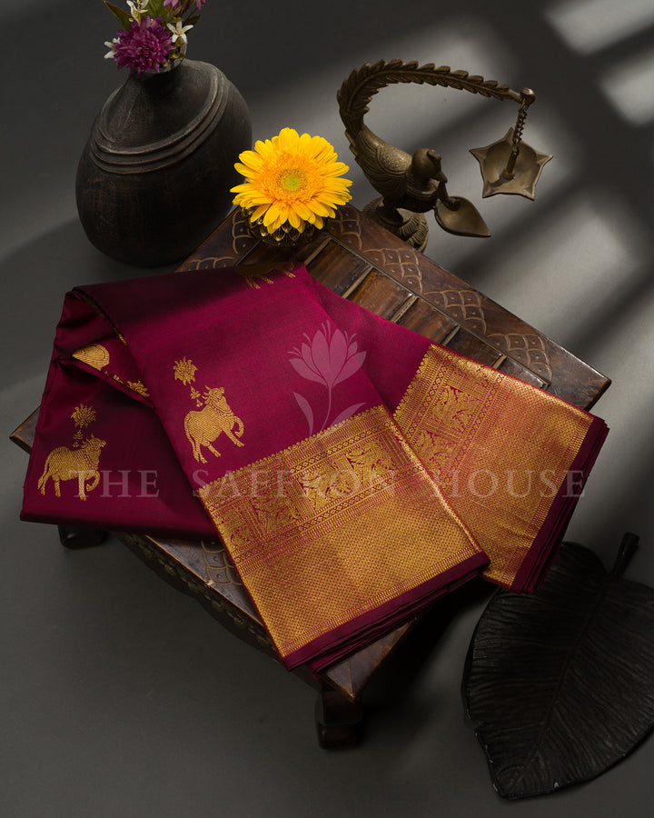 Magenta Kanchivaram Silk Saree with Gold Zari Elephant Motifs, Wide Gold Border