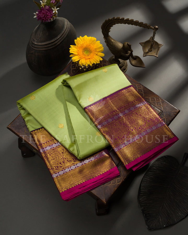 Pista Green Kanchivaram Silk Saree with Gold Zari Buttis, Wine Peacock Border