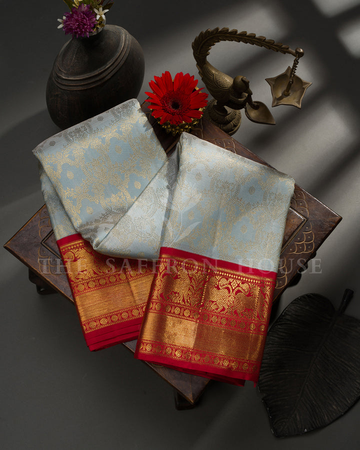 Powder Blue Kanchivaram Silk Saree with Zari Floral Jaal, Red Border with Elephant Motifs