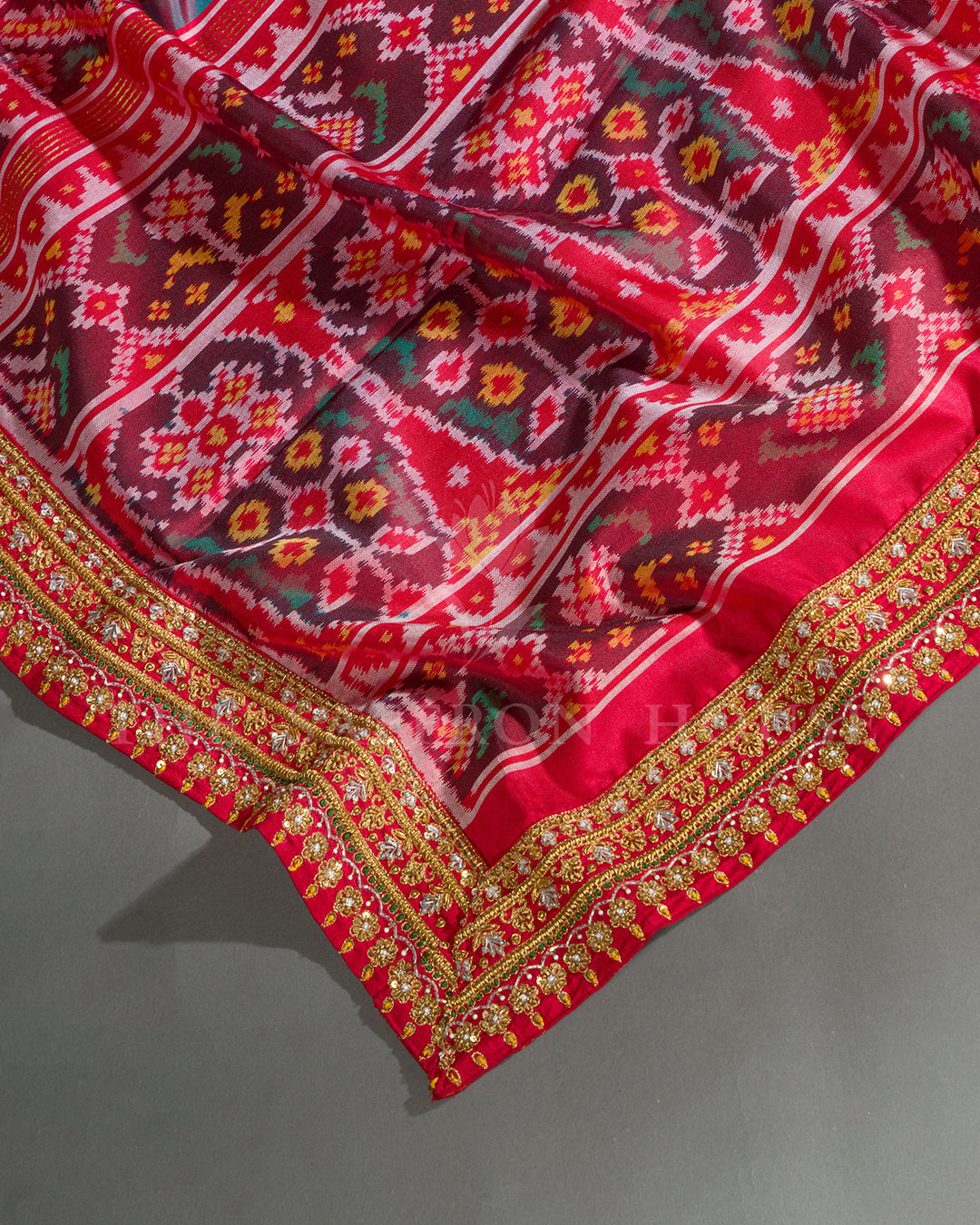 Red Hand Embroidered Border Ikat Silk Saree