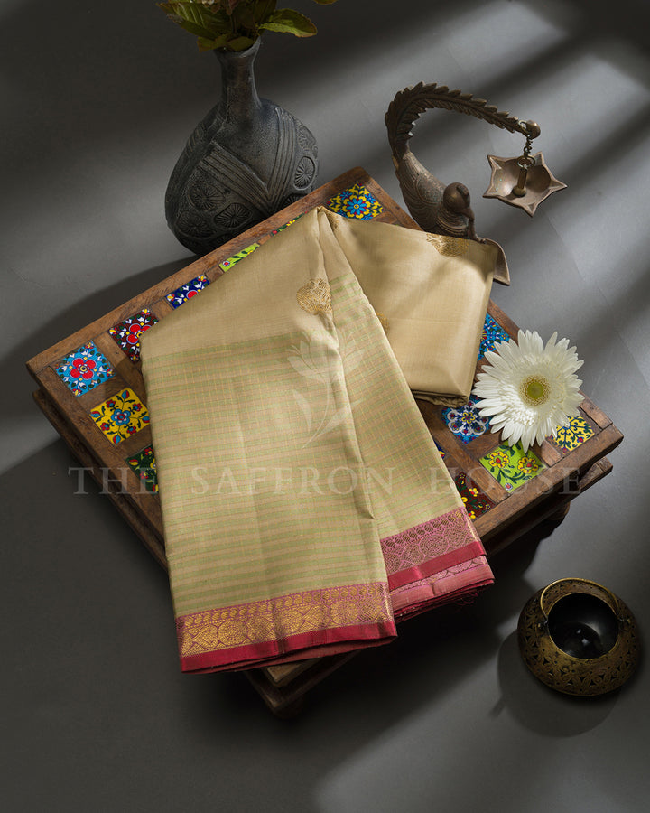 Cream Kanchivaram Silk Saree with Zari Buttas