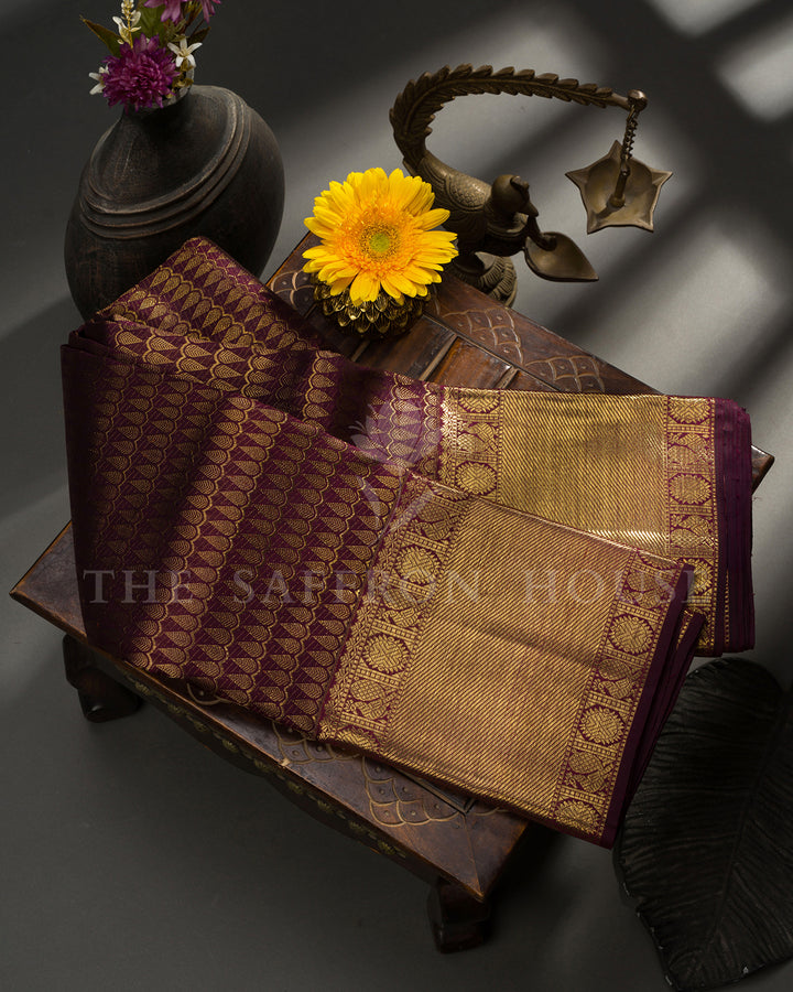 Burgundy Kanchivaram Silk Saree with Gold Leaf Weave & Peacock Border