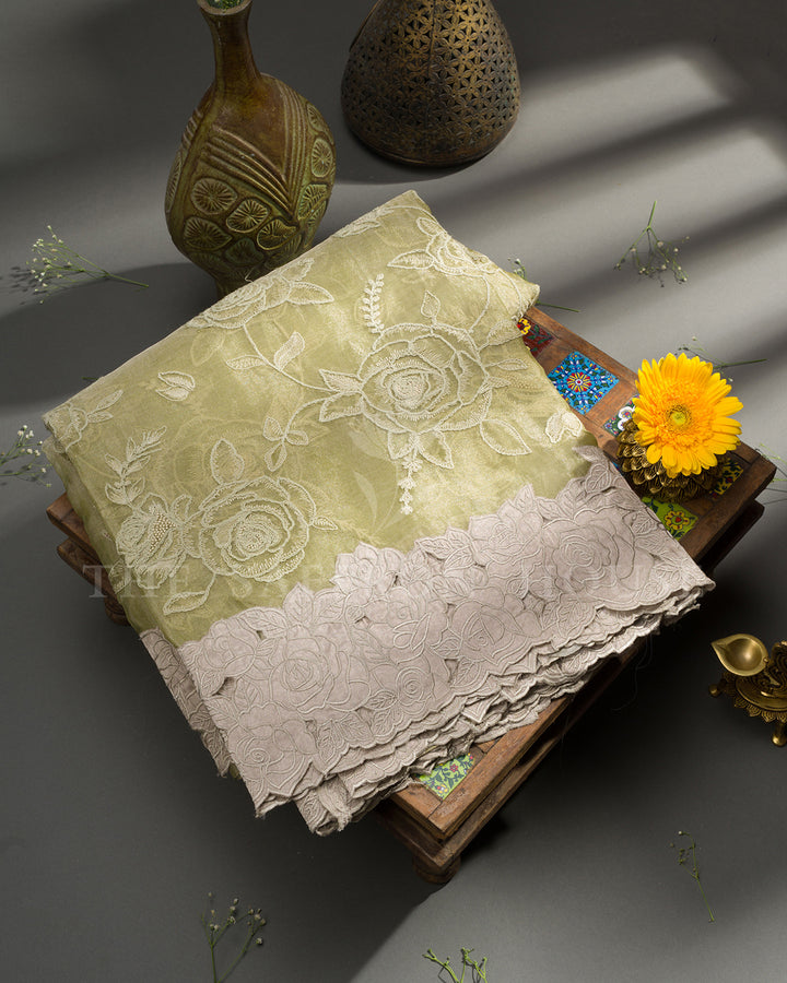 Pale Olive Green Organza Tissue Saree with All-Over Rose Embroidery & Cutwork Scalloped Border