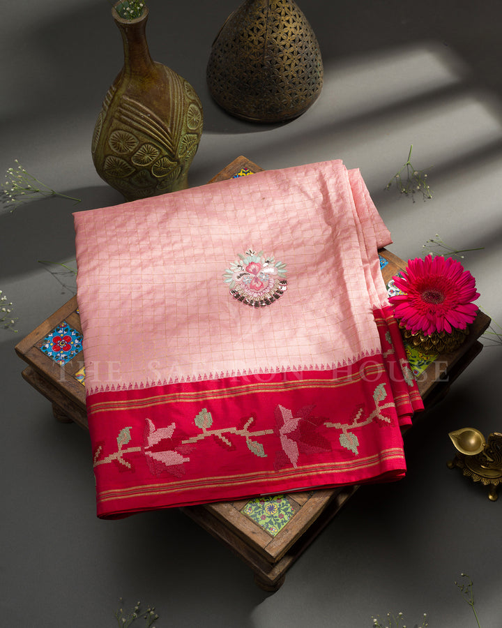 Peach Silk Saree with Zari Check Weave & Hand-Embroidered Rose Vine Border