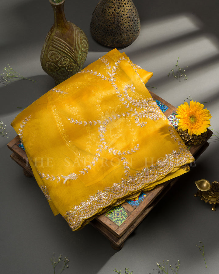 Mustard Yellow Organza Saree with Silver Sequin Paisley Vine Embroidery & Scalloped Border