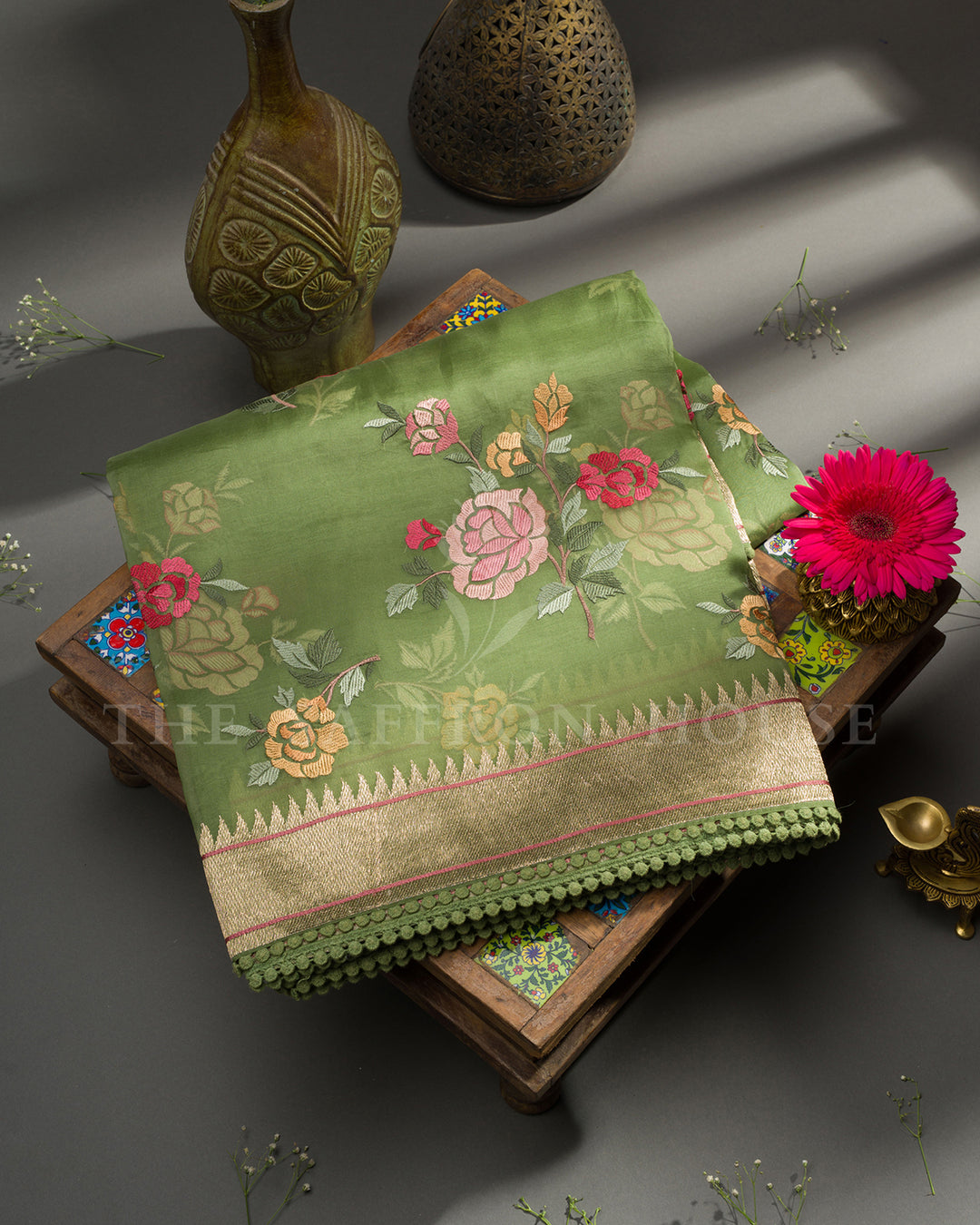 Moss Green Organza Saree with Multicolor Rose Embroidery & Temple Border