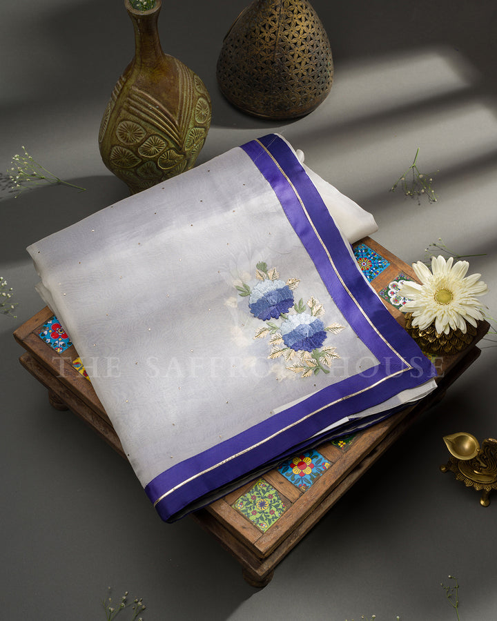 Ivory Tussar Silk Saree with Blue Floral Embroidery & Contrast Blue Blouse