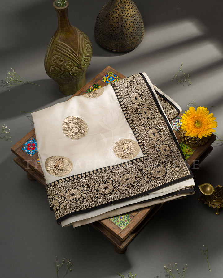 Ivory Tussar Silk Saree with Bird Motif Butis & Contrast Black Zari Border