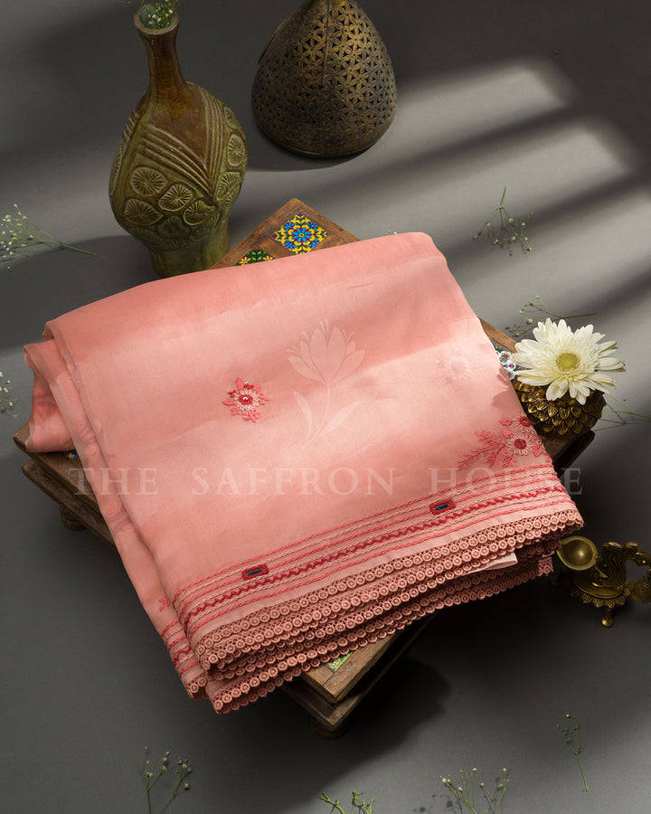 Peach Organza Saree with Floral Thread Embroidery, Mirror Work and Crochet Lace Border