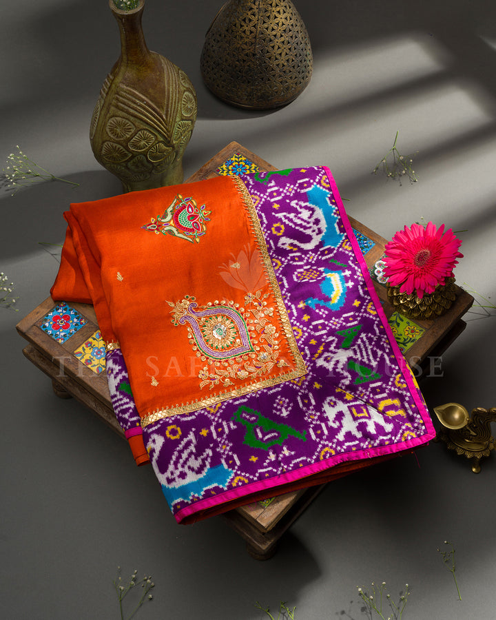 Marigold Orange Tussar Silk Saree with Ikat Fusion Border and Zardosi Buttas