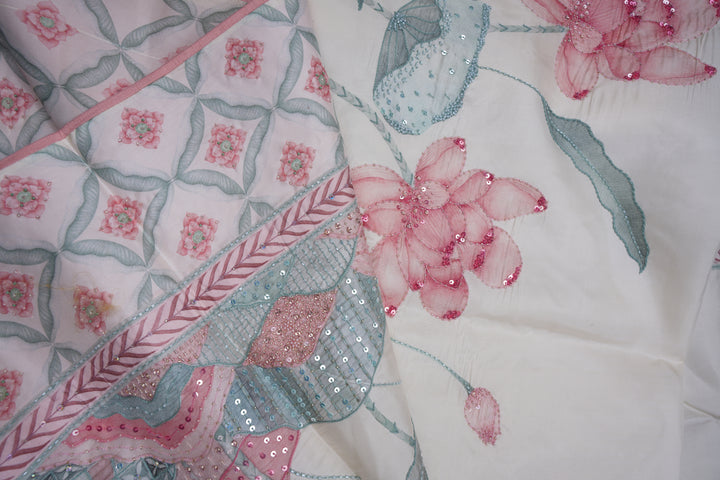 Blooming Heiress – Lotus Bloom Kanchi Silk Saree with Pearl-Edged Border