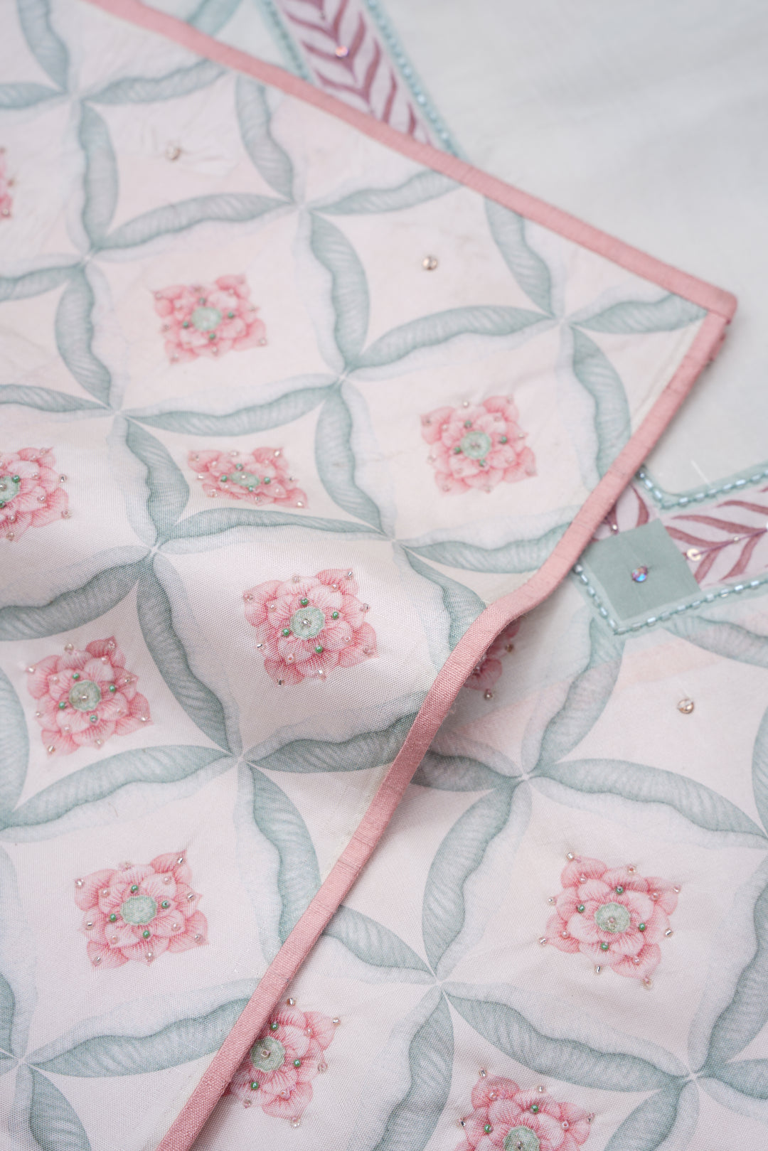 Blooming Heiress – Lotus Bloom Kanchi Silk Saree with Pearl-Edged Border