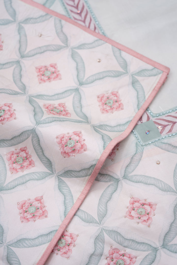 Blooming Heiress – Lotus Bloom Kanchi Silk Saree with Pearl-Edged Border