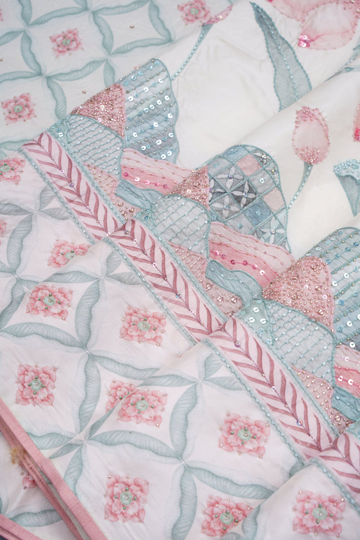 Blooming Heiress – Lotus Bloom Kanchi Silk Saree with Pearl-Edged Border