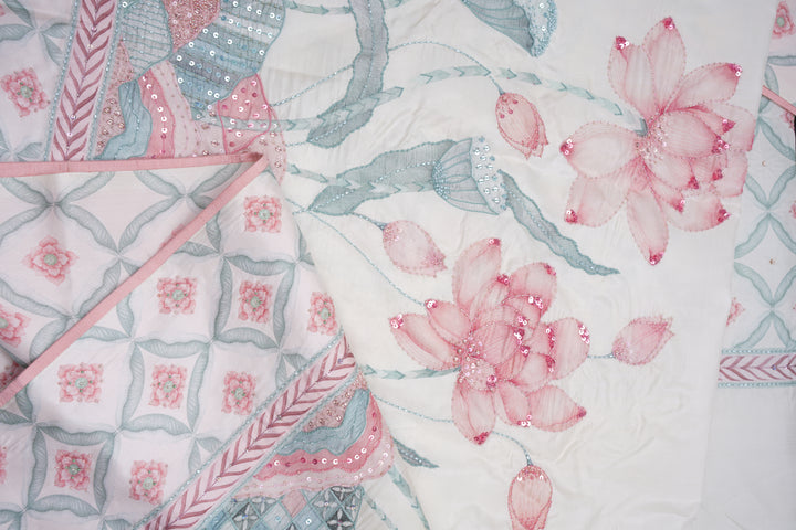 Blooming Heiress – Lotus Bloom Kanchi Silk Saree with Pearl-Edged Border