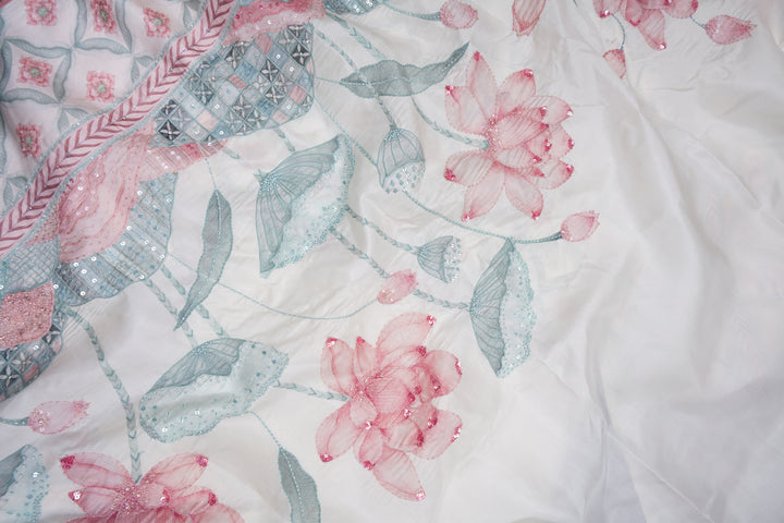 Blooming Heiress – Lotus Bloom Kanchi Silk Saree with Pearl-Edged Border