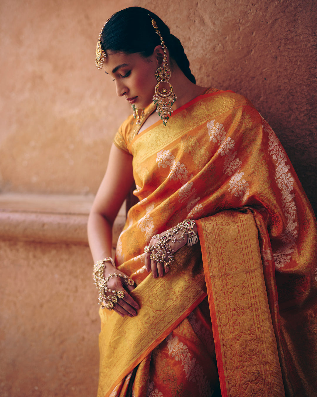 Orange Pure Kanjivaram Silk Saree with Silver Zari Parrot Buttas & Gold Zari Border