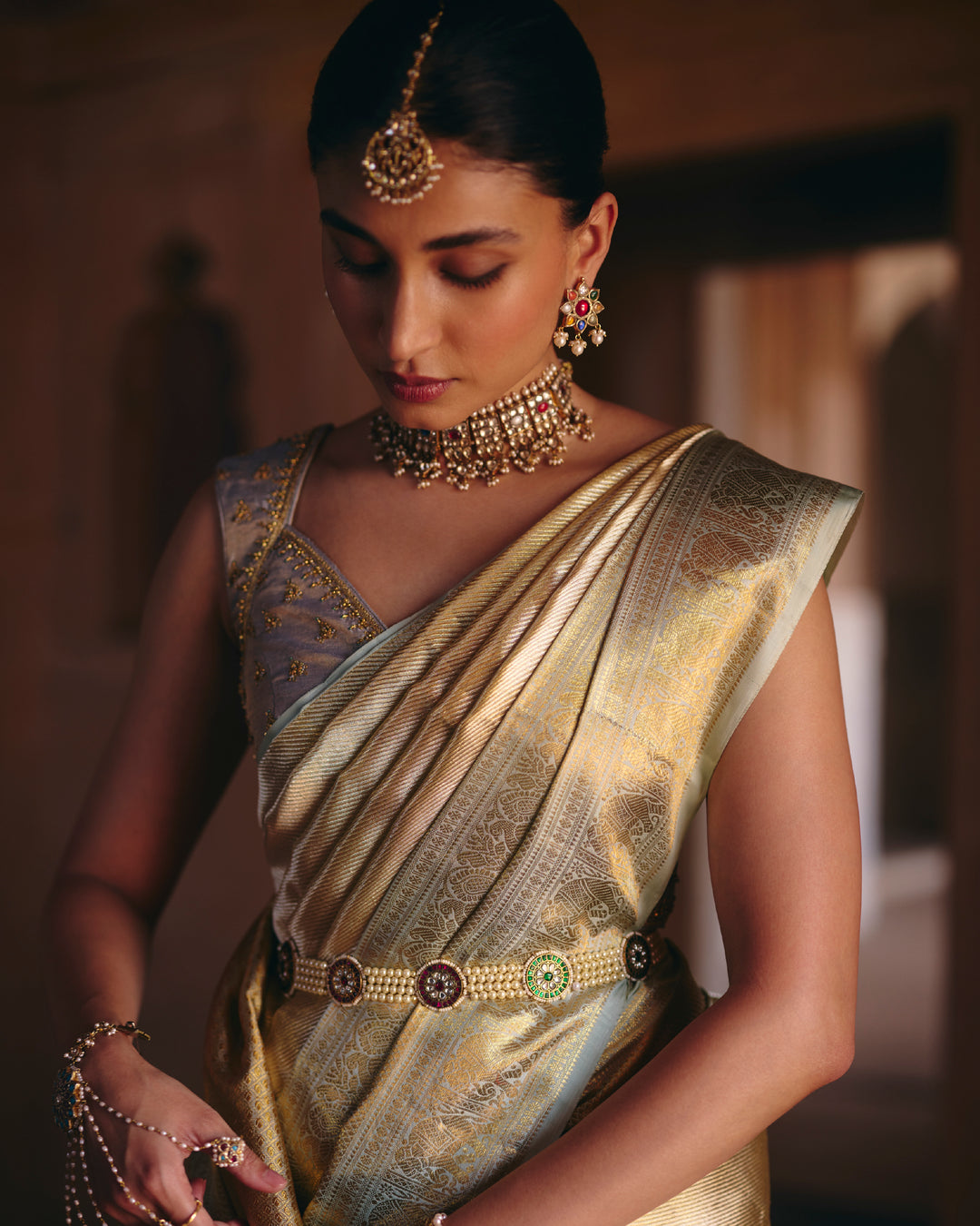 Ivory Pure Kanjivaram Tissue Silk Saree with Gold Zari Weave & Traditional Woven Border