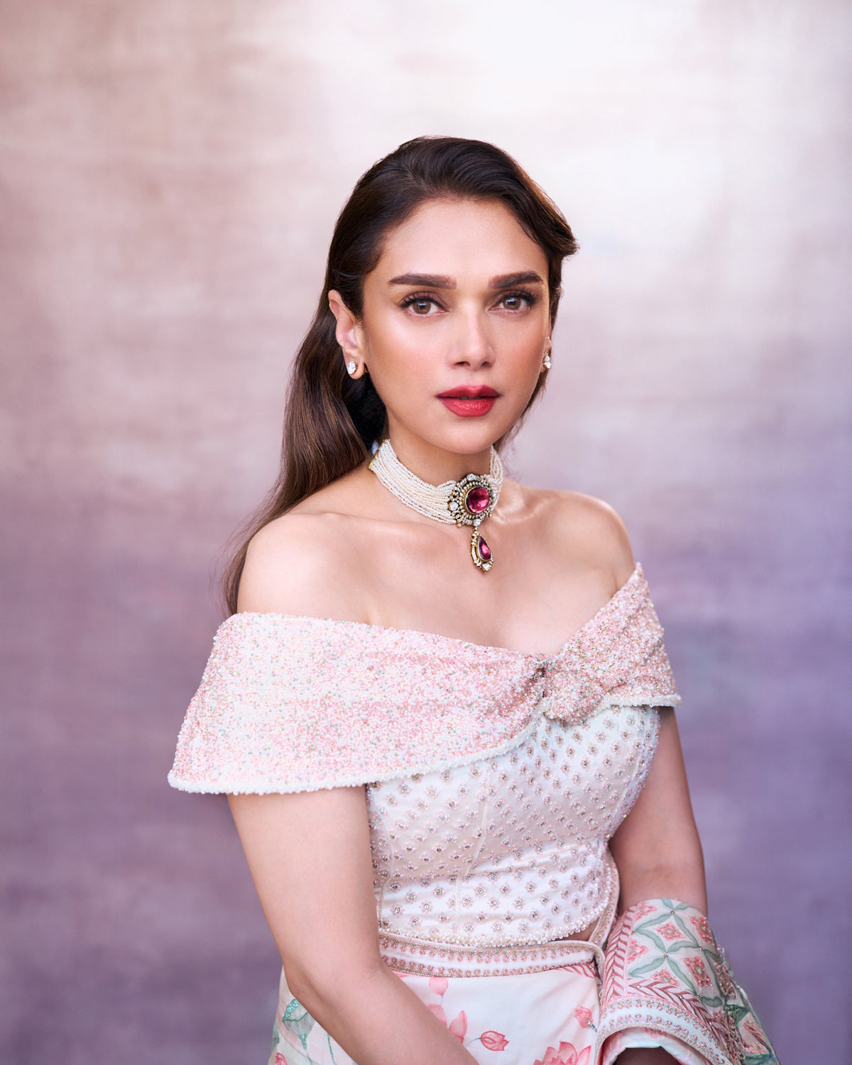 Aditi Rao Hydari wearing a pale saree and an embellished blouse