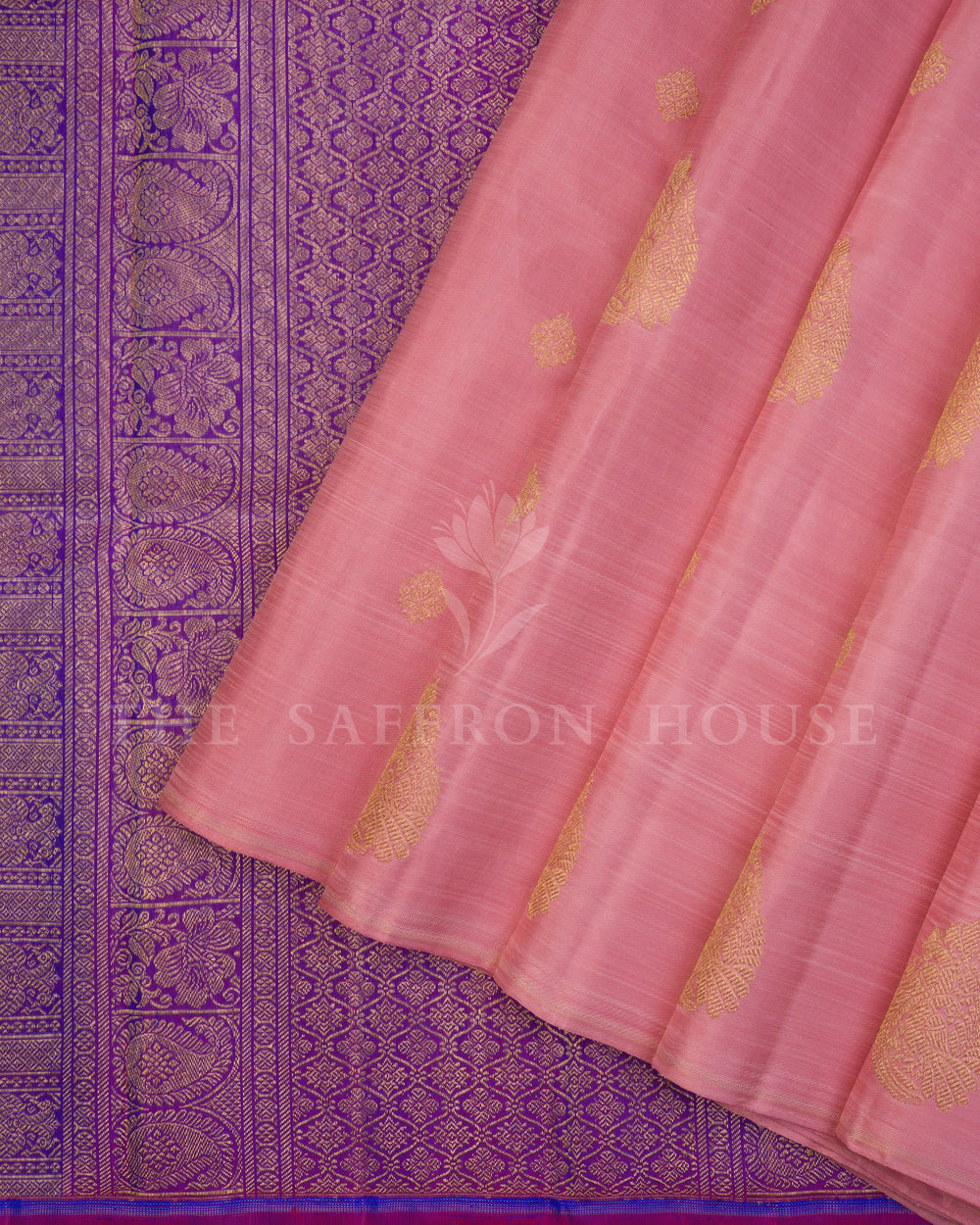 Baby pink and violet handwoven borderless Kanjivaram saree by The Saffron House, showcasing intricate traditional silk weaving.