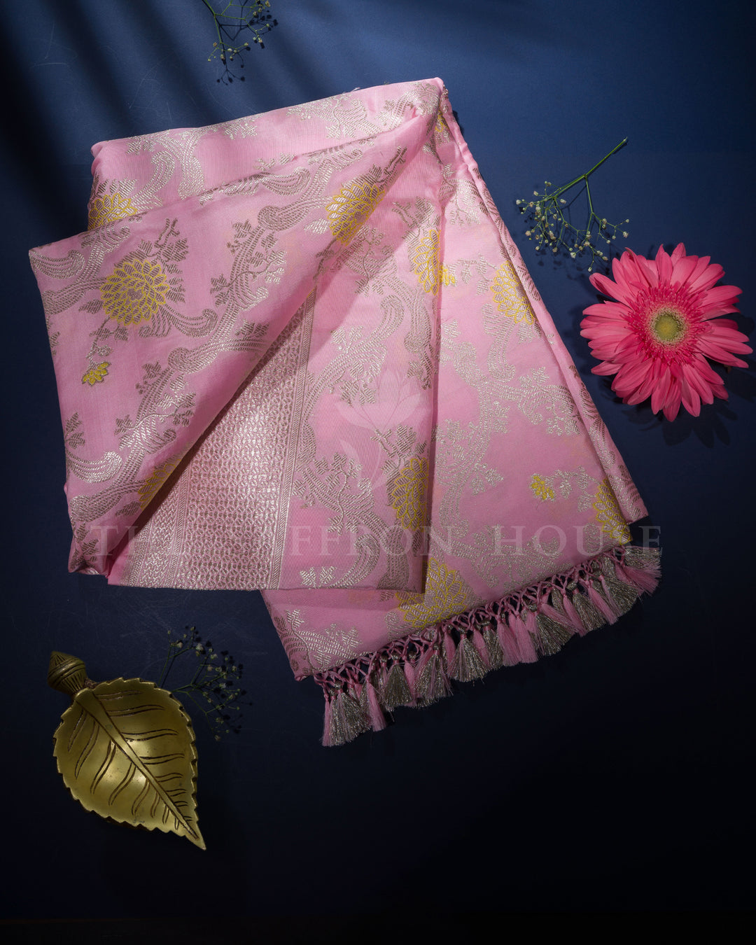 Baby pink handwoven Banarasi silk saree with intricate gold zari work, crafted by The Saffron House.