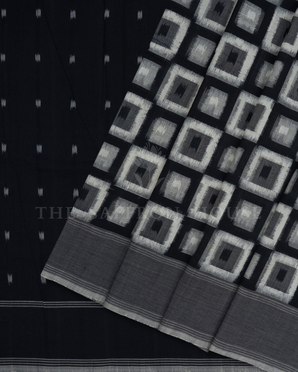 Pure White And Onyx Black Handwoven Patola Saree – The Saffron House
